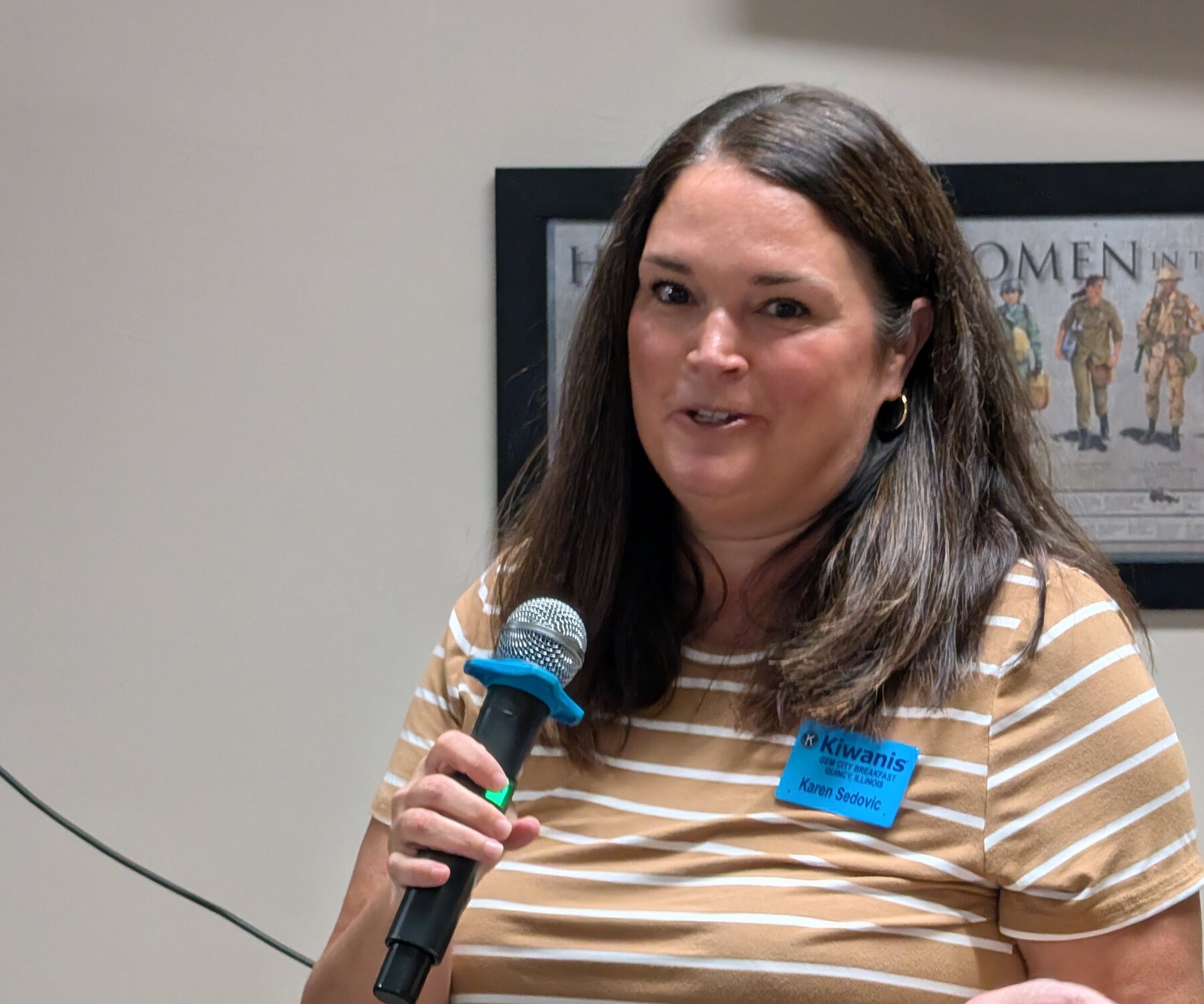 Karen Sedovic speaking after being named Gem City Kiwanian of the Year